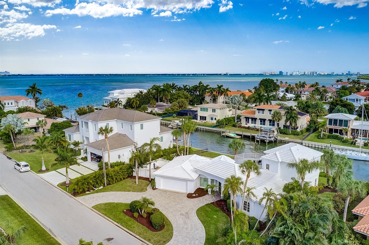 Arial view of houses along the road with Sarasota Bay in the background