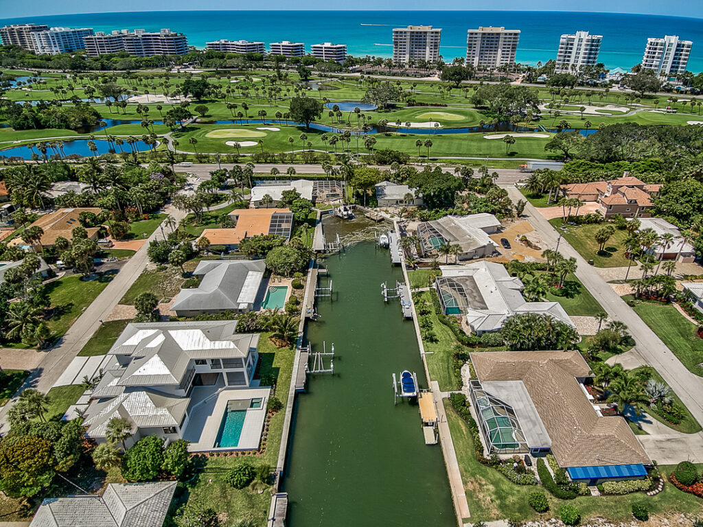 An arial view of some of Longboat Keys neighborhoods featuring both canal and gulf front homes