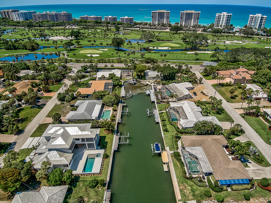 An arial view of some of Longboat Keys neighborhoods featuring both canal and gulf front homes